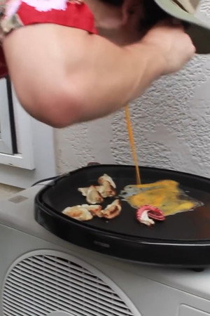 PINK GUY COOKS TAKOYAKI AND RAPS