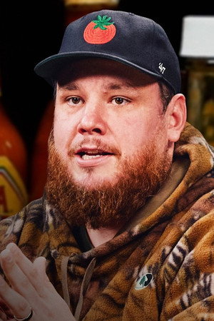 Luke Combs Feels a Heat Hurricane While Eating Spicy Wings