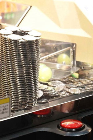 The Lure of Token Games at an Amusement Arcade