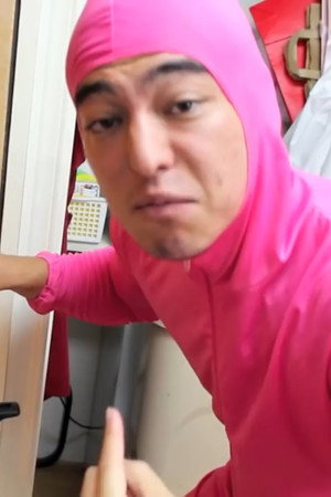 PINK GUY COOKS FRIED RICE AND RAPS