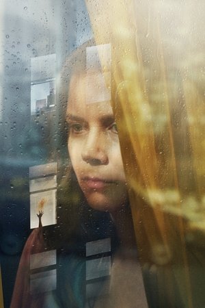 La mujer en la ventana