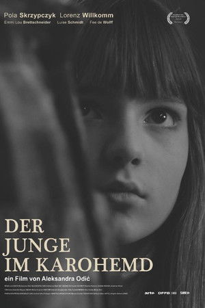 Der Junge im Karohemd