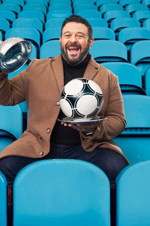 Adam Richman Eats Football