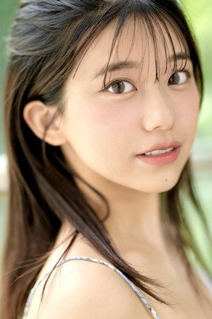 川越仁子