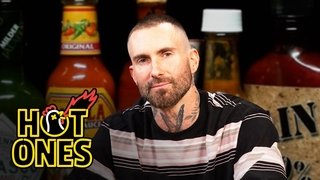 Adam Levine Gives a Halftime Speech While Eating Spicy Wings