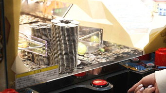 The Lure of Token Games at an Amusement Arcade