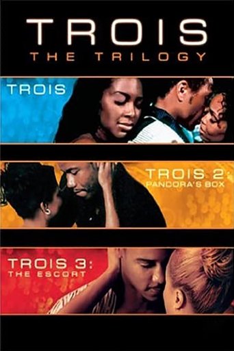 The movie collection title "Trois" can be translated to Albanian as "Të Tre".