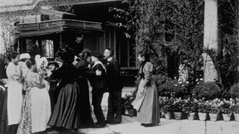 L'arrivée en voiture (1896)
