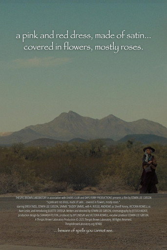 a pink and red dress, made of satin… covered in flowers, mostly roses