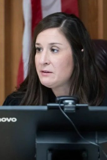 Megan Marshall is Self - Charges Hearing Judge (archive footage)