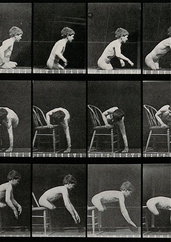 A double amputee climbing on to a chair, descending from a chair
