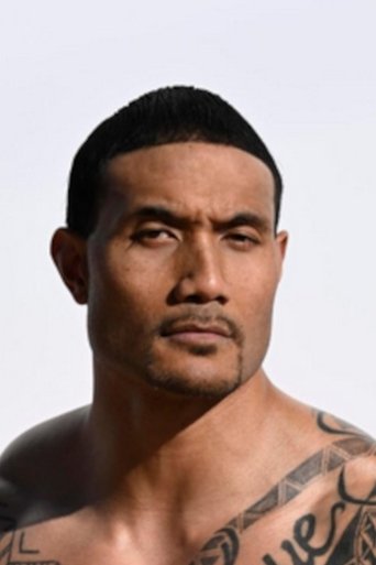 J.T. Tomangi headshot
