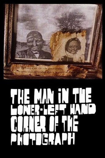 The Man in the Lower-Left Hand Corner of The Photograph (1997)