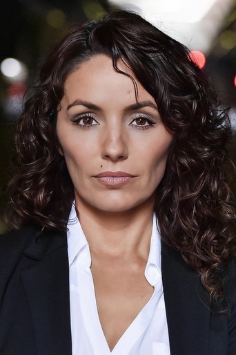 Romy Peniche headshot