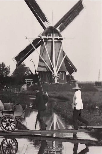 Dog Pulls Cart in Front of Mill