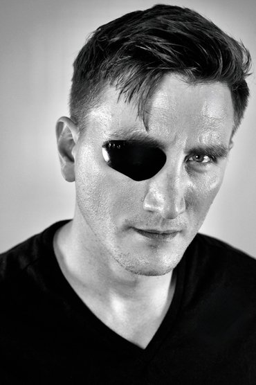 Professional headshot of Jason Trost