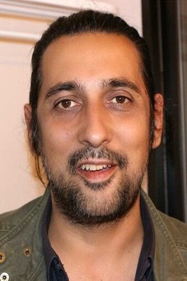 Professional headshot of Pablo Adán