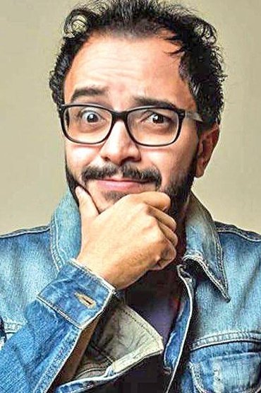 Professional headshot of Hossam Dagher