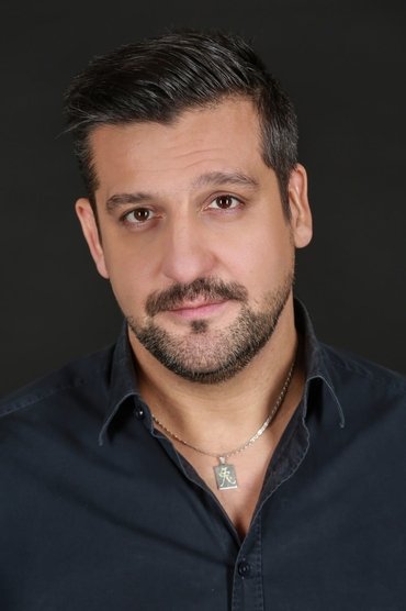 Professional headshot of Sándor Csányi