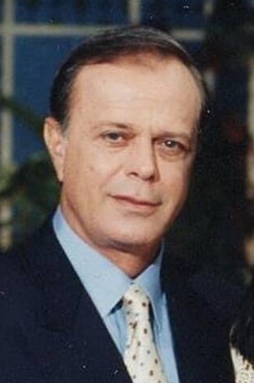 Professional headshot of Christos Politis