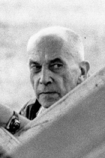 Professional headshot of Chris Marker