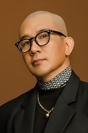 Professional headshot of Koo Jun-yup
