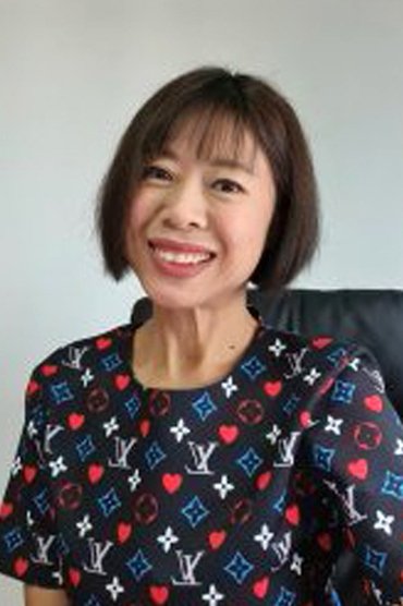 Professional headshot of Kusuma Teppharak