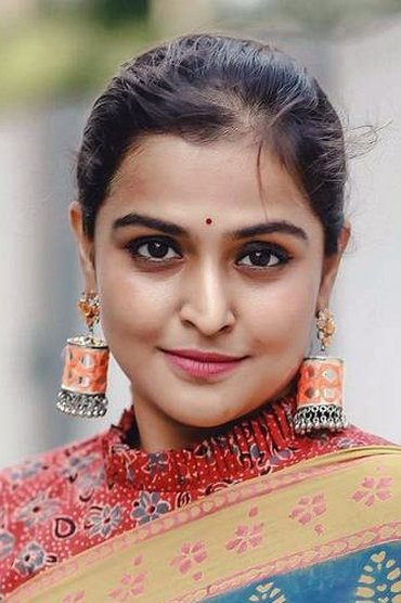 Professional headshot of Remya Nambeesan