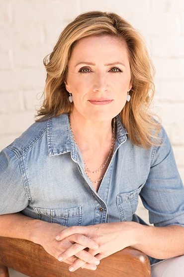 Professional headshot of Kirsten Nelson