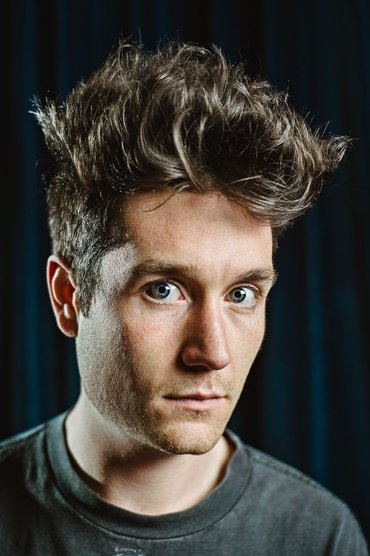 Professional headshot of Dan Smith