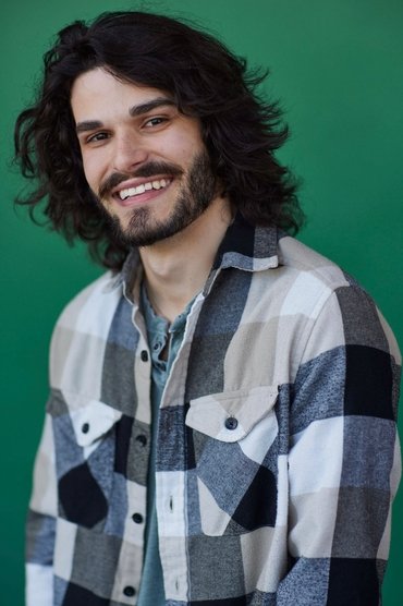 Professional headshot of Ross Kaplan