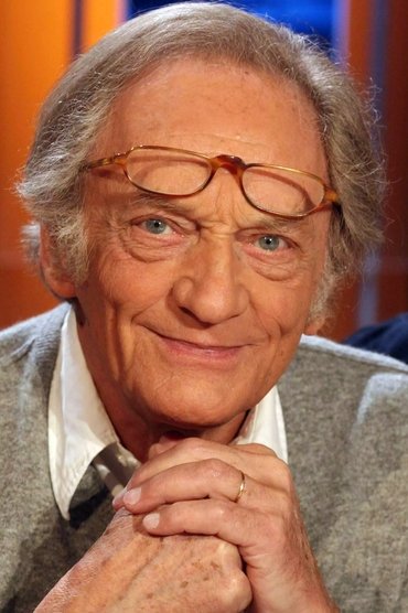 Professional headshot of Philippe Tesson