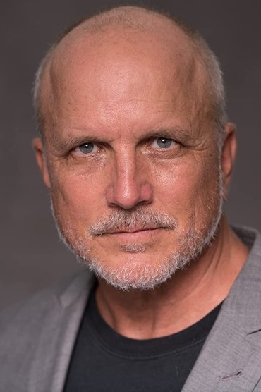 Professional headshot of Flint Beverage