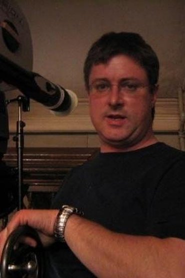 Professional headshot of Eric Red
