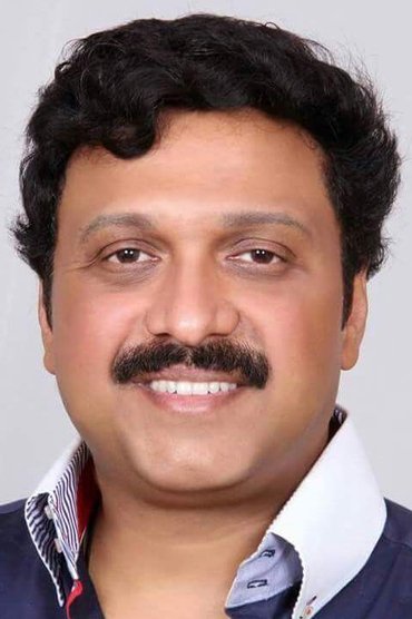 Professional headshot of K. B. Ganesh Kumar