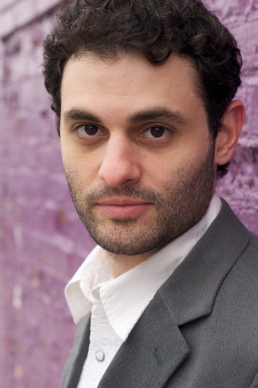 Professional headshot of Arian Moayed