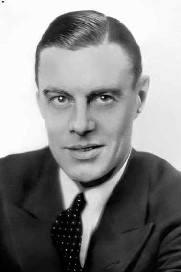 Professional headshot of Colin Clive