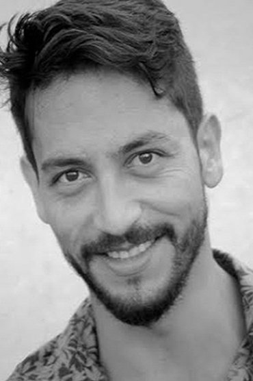 Professional headshot of Carlos Medina