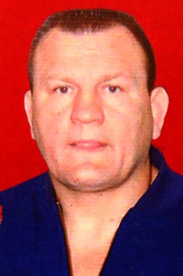 Professional headshot of Gene Kiniski