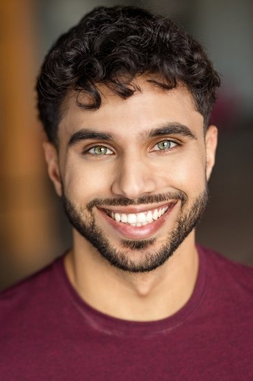 Professional headshot of Ismail Taher