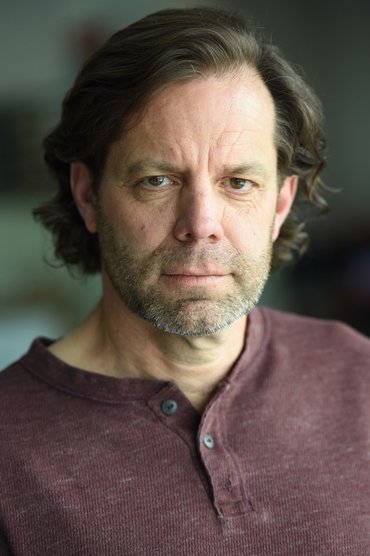Professional headshot of Chris Gaunt