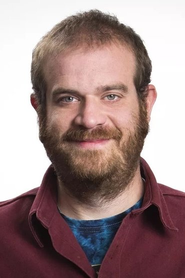 Professional headshot of Eric Edelstein