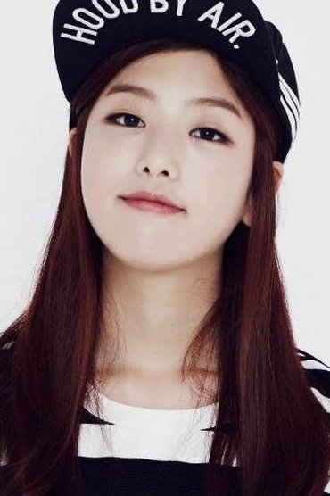 Professional headshot of Kisum