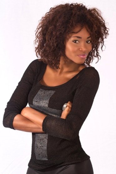 Professional headshot of María Nela Sinisterra