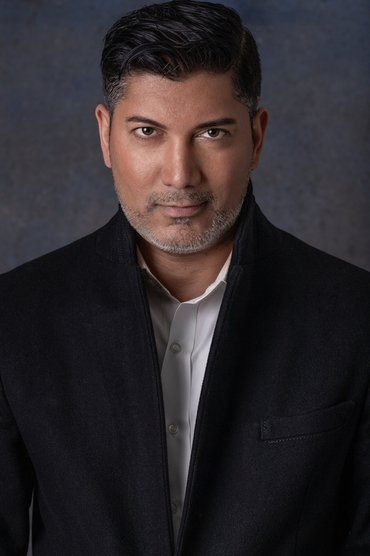 Professional headshot of Zahf Paroo