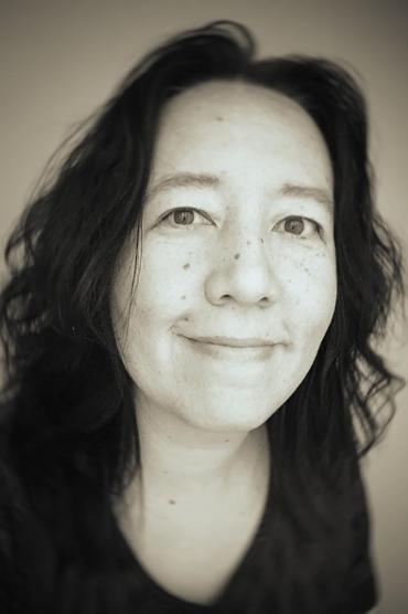 Professional headshot of Jun Falkenstein
