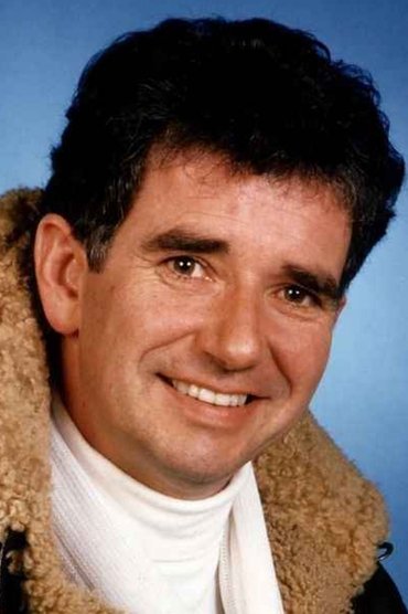 Professional headshot of Elton Welsby
