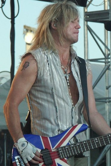 Professional headshot of Rick Savage