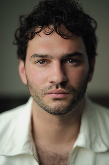 Professional headshot of Theodore Bhat