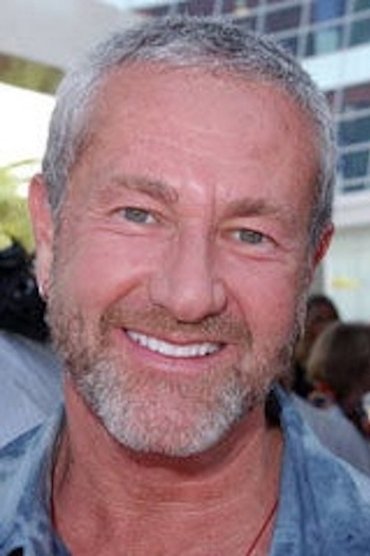 Professional headshot of Charlie Adler